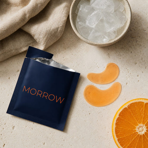 Open sachet with patches next to a bowl of ice